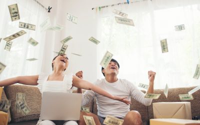 happy couple smiling successful sitting money rain business online concept scaled